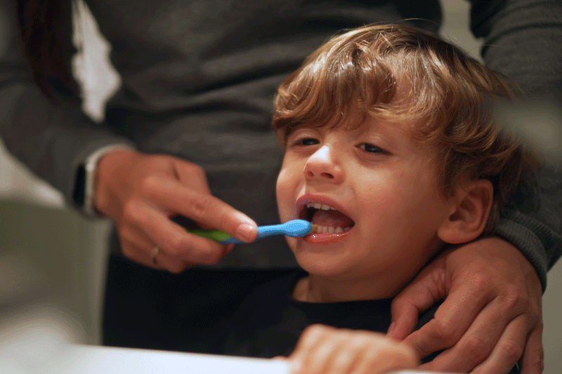 Child reluctant to brush teeth